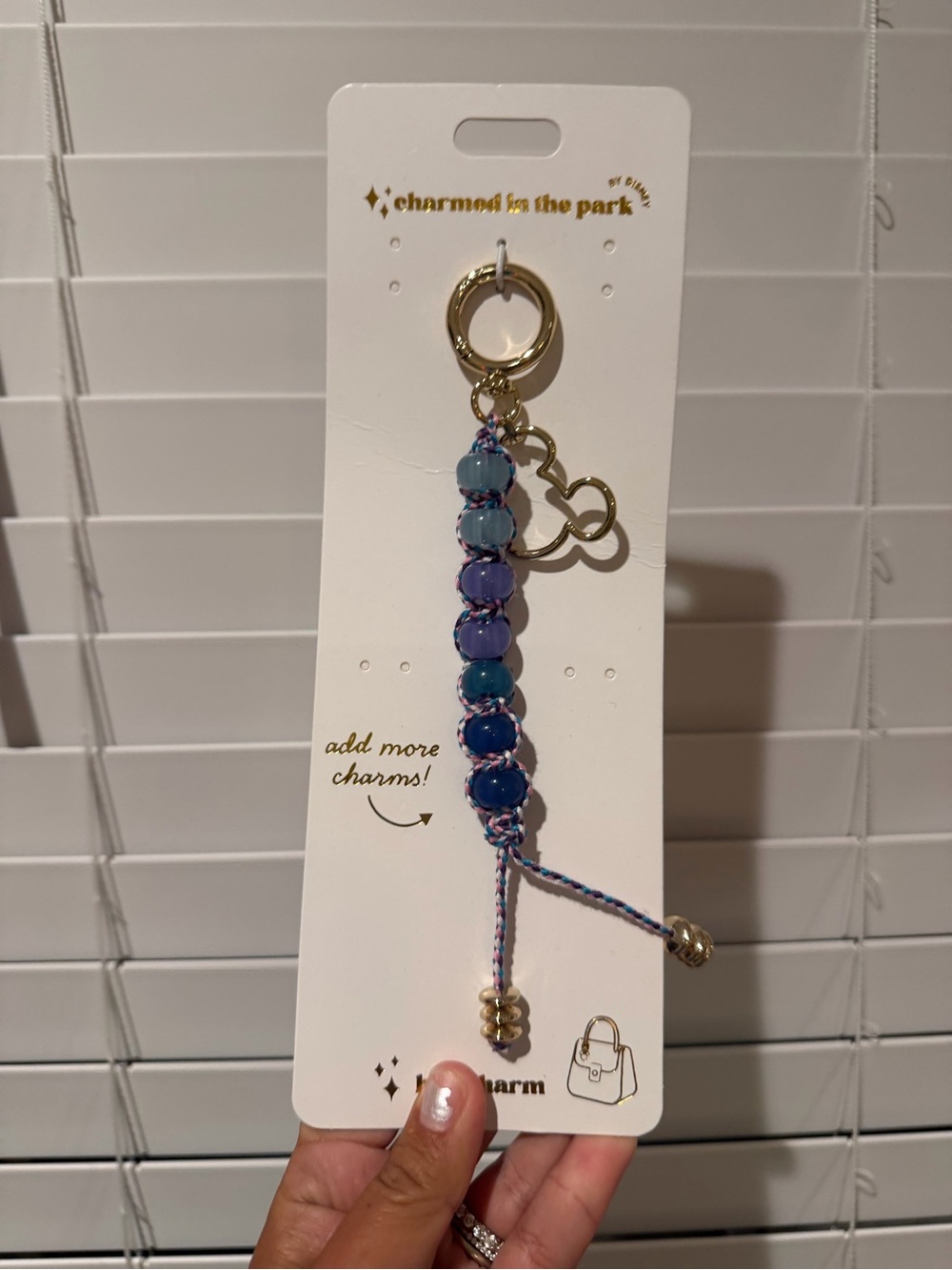 Disney charmed in the park Gold Keyring with Blue Bead Tassel bag charm